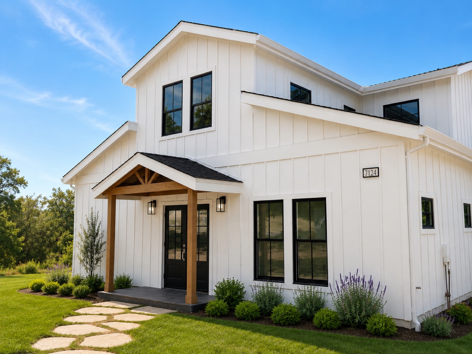 Two-story modern farmhouse with timber entry porch